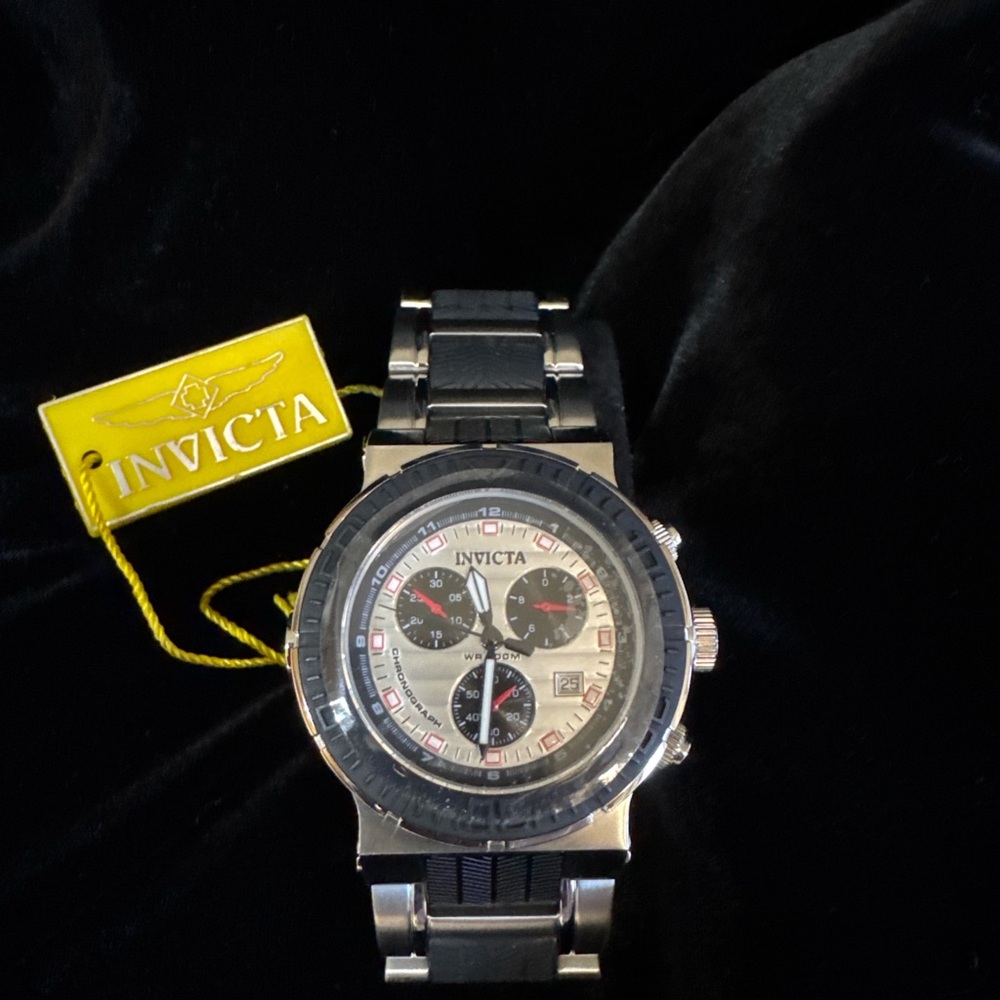 Invicta Silver Watch with Black Strap and Yellow Tag